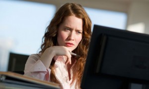 Woman researching laser rejuvenation treatments